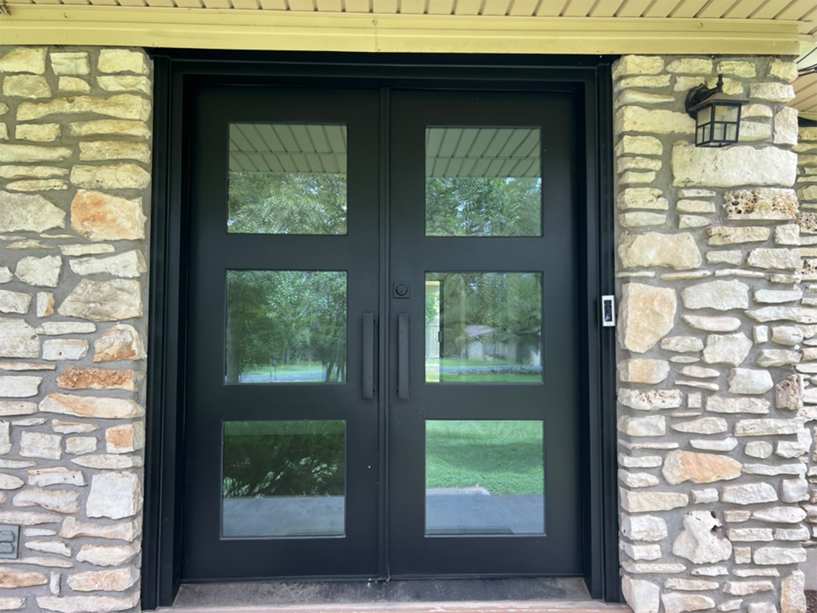 The front entry viewed straight on, with the Ring Video Doorbell Pro mounted on the right side of the recessed doorway