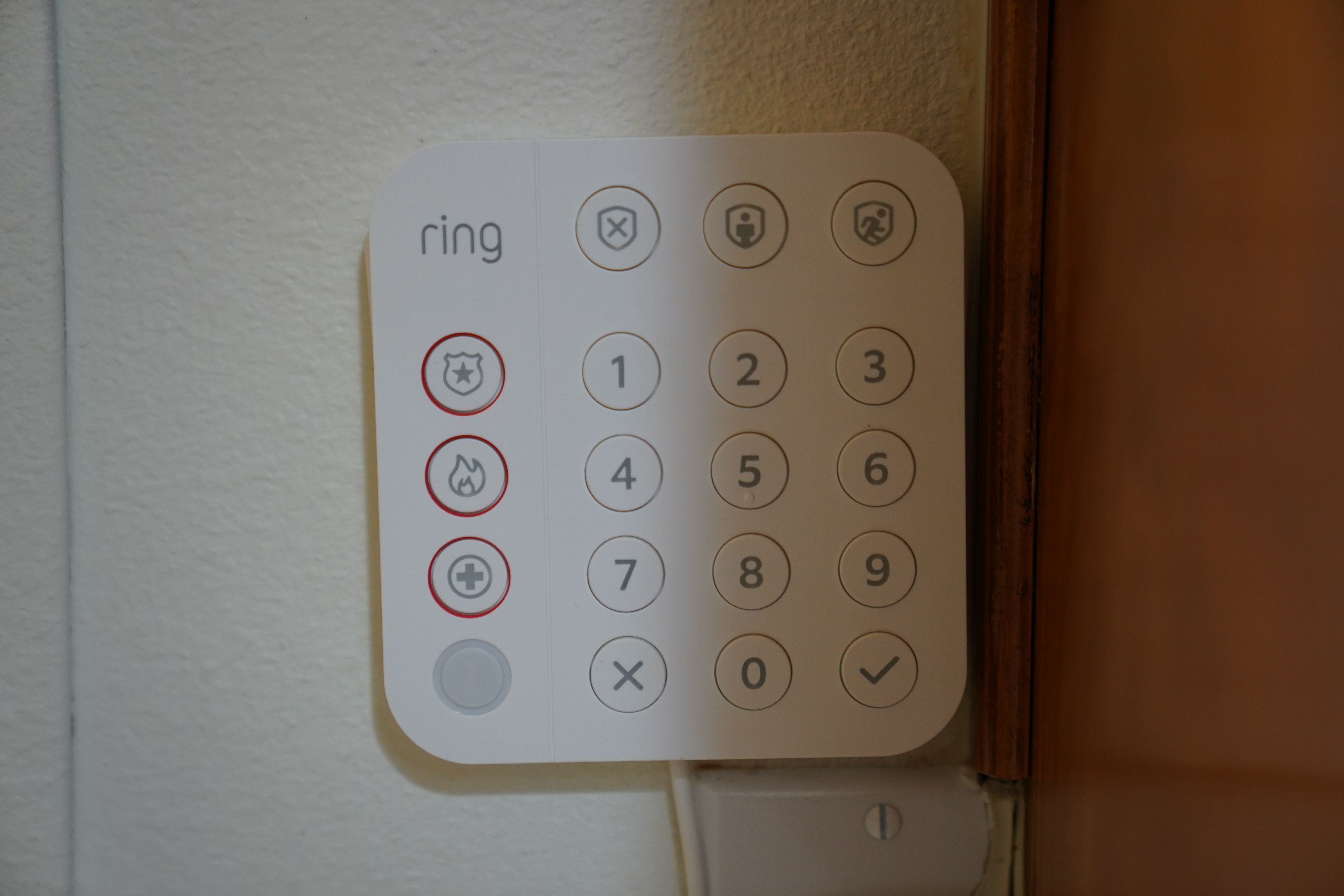 The Ring Alarm keypad mounted on the wall by the door