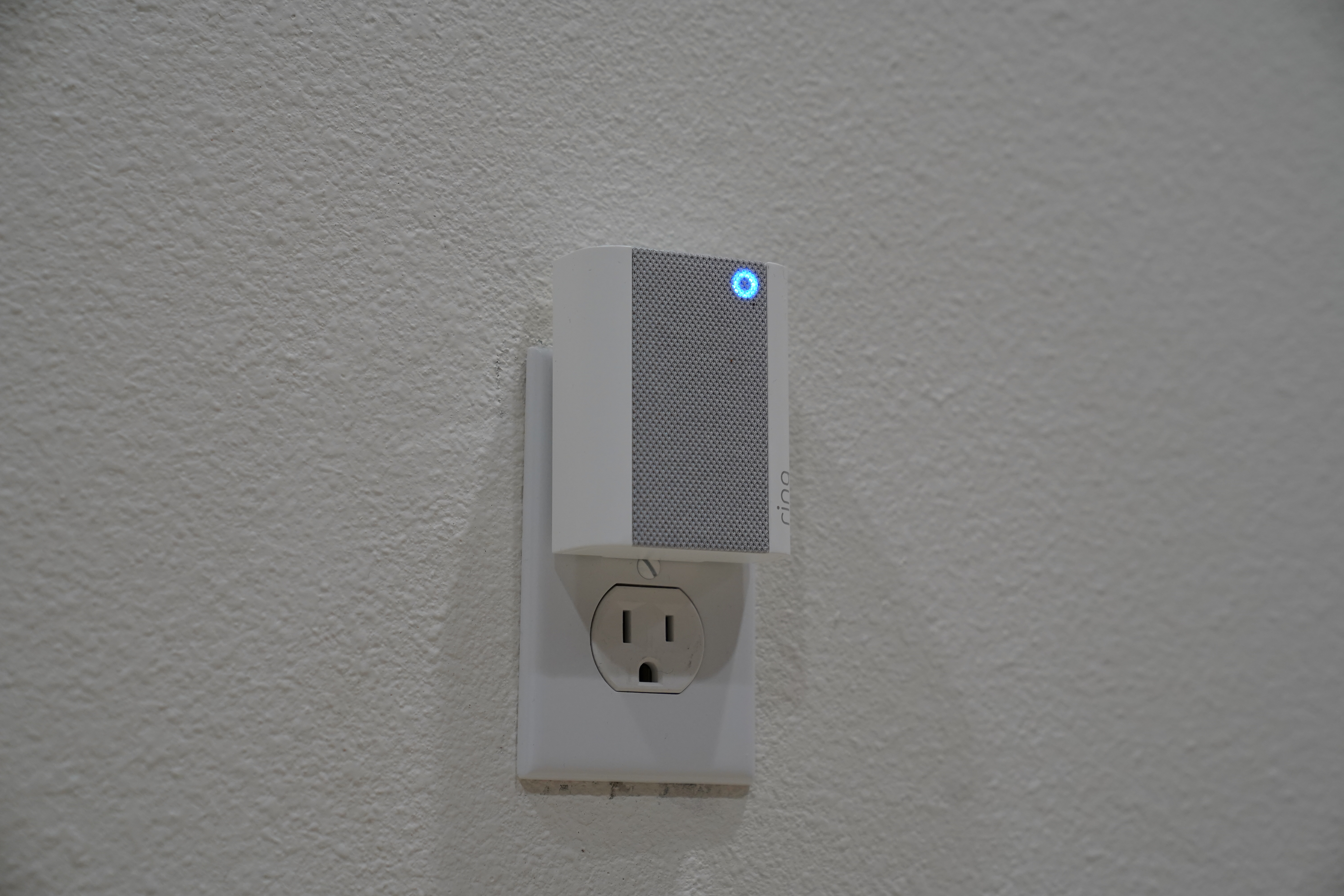 A Ring Chime lit up blue as an alert sounds