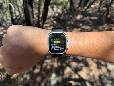 An Apple Watch Ultra 2 showing heart rate spiking into Zone 3 on a climb