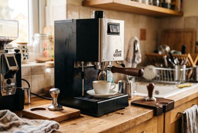 The De'Longhi Stilosa, an entry-level manual espresso machine, on a kitchen counter