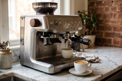 The Breville Oracle Touch, a premium automatic espresso machine with a built-in grinder