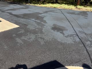 Wet coating partway through application, with heavier and lighter areas visible before it dried