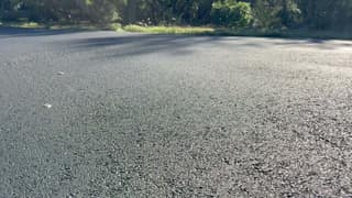The finished surface after the coating dried to a uniform dark satin black