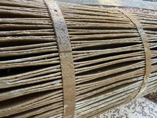 Macro view of dirty brown pool filter cartridge pleats