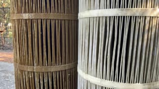 Close-up comparison of dirty brown pleats beside clean light gray pleats