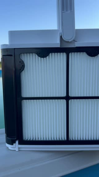 A close view of clean pleated NanoFilter panels on the Dolphin Escape MaxBin