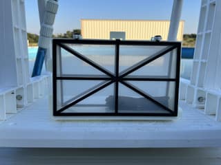 A clean Nautilus CC Plus cartridge assembly standing on the pool deck