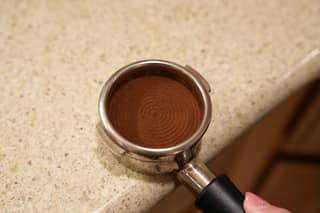 A level, tamped puck with even rings