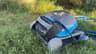 The Dolphin Cayman on the lawn with its cable and float