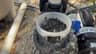 Pump strainer basket full of wet leaves and debris before cleaning