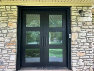 The front entry viewed straight on, with the Ring Video Doorbell Pro mounted on the right side of the recessed doorway