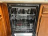 The Samsung StormWash's three racks, fold-down tines, and lower silverware basket